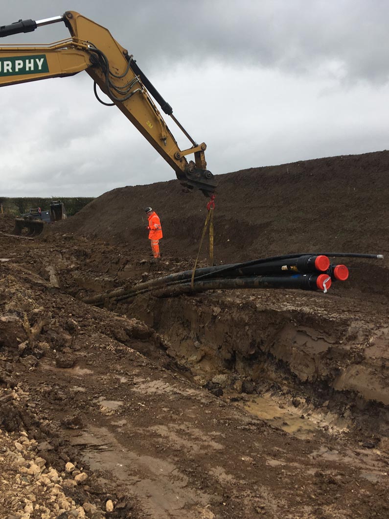 pipe-lowering_795x1050 Triton Knoll Duct Install